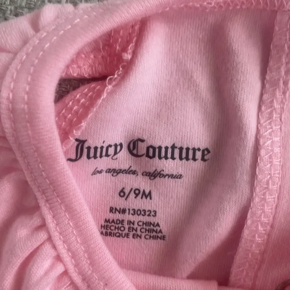 Juicy Couture pink ruffle Short sleeve onesie